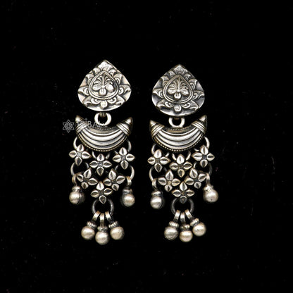 Sterling silver floral stud earrings with hanging drop dangle design, by TRIBAL ORNAMENTS, showcasing intricate floral craftsmanship.
