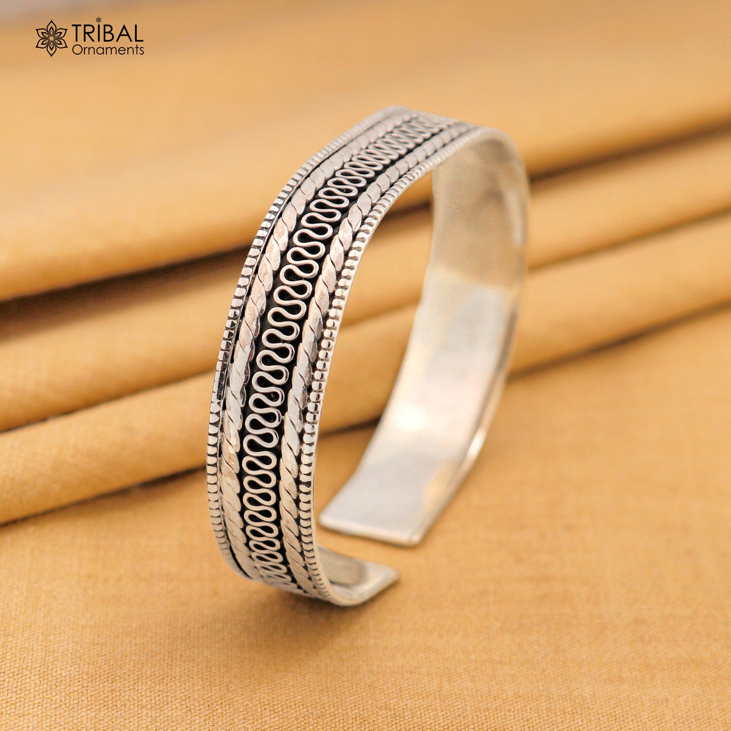 925 sterling silver vintage-style handmade bangle cuff bracelet with intricate tribal design by TRIBAL ORNAMENTS.