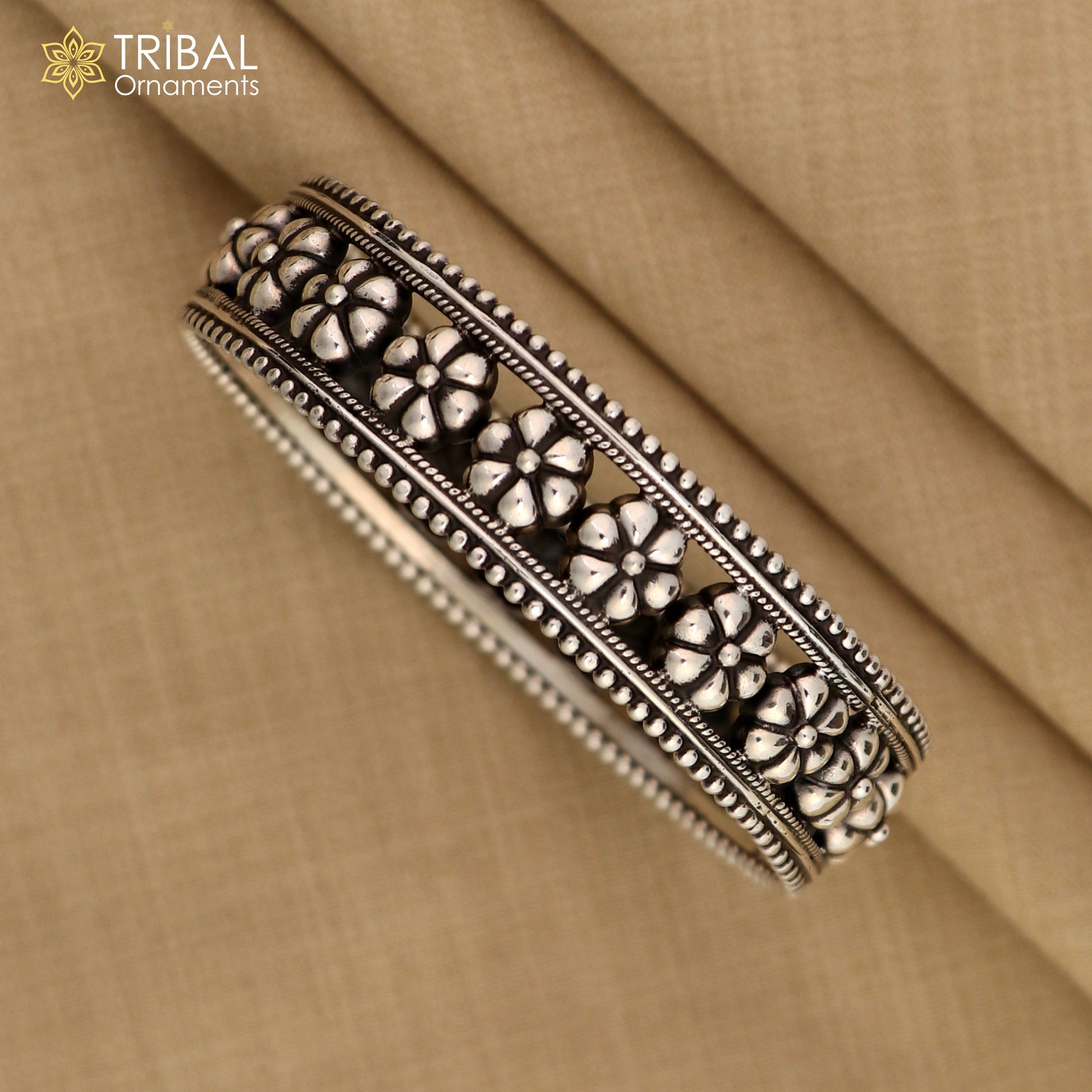 925 sterling silver vintage floral bangle bracelet with tribal ethnic design from TRIBAL ORNAMENTS.
