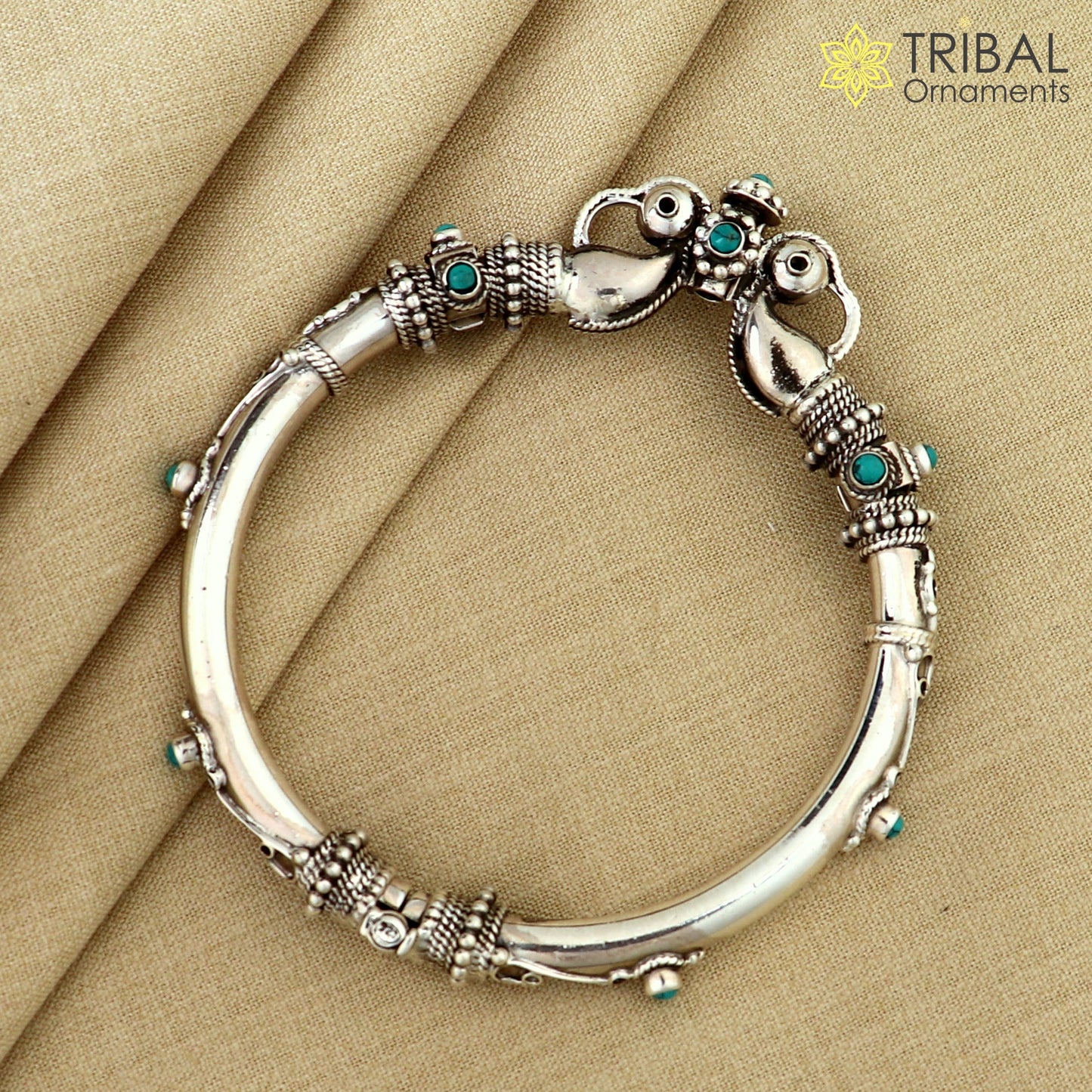 Sterling silver vintage peacock design bangle with turquoise stone, tribal ethnic jewelry by TRIBAL ORNAMENTS.