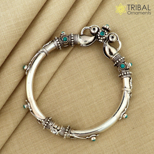 Sterling silver vintage peacock design bangle with turquoise stone, tribal ethnic jewelry by TRIBAL ORNAMENTS.