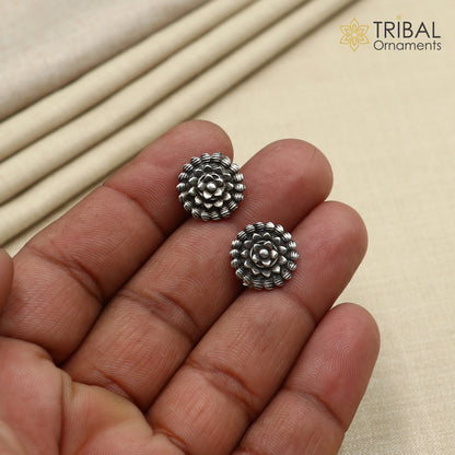 Vintage style flower design sterling silver stud earring by TRIBAL ORNAMENTS featuring intricate ethnic flower motifs.