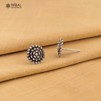 Sterling silver vintage-style flower design stud earring by TRIBAL ORNAMENTS with intricate ethnic detailing.