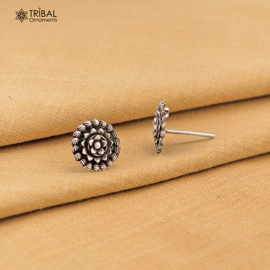 Sterling silver vintage-style flower design stud earring by TRIBAL ORNAMENTS with intricate ethnic detailing.