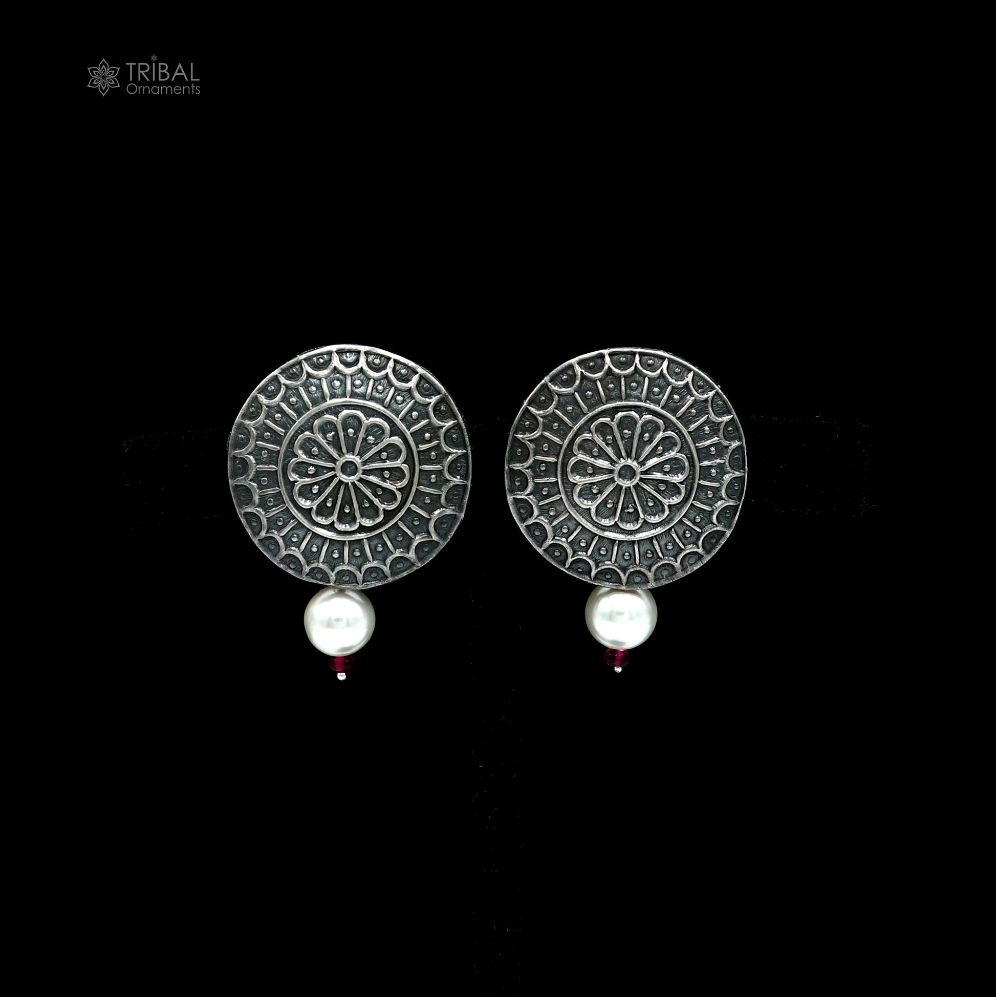 Vintage style round sterling silver traditional earring by TRIBAL ORNAMENTS with intricate design and classic craftsmanship.