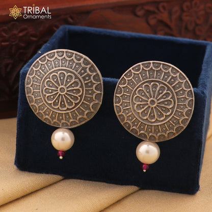 Vintage style round 925 sterling silver traditional earring by Tribal Ornaments, featuring intricate tribal design.