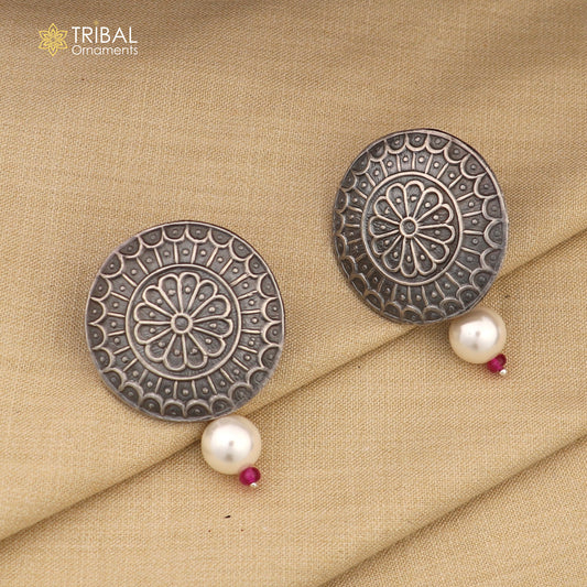 Vintage-style round shape 925 sterling silver traditional earring by TRIBAL ORNAMENTS, showcasing intricate tribal design.