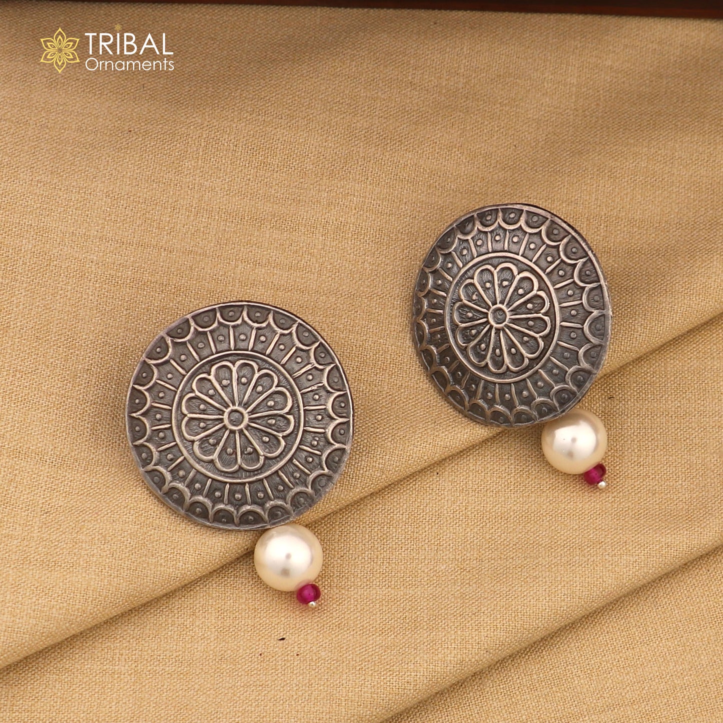 Vintage style round 925 sterling silver traditional earring by TRIBAL ORNAMENTS, featuring intricate tribal design.
