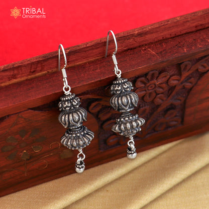 Sterling silver vintage-style tribal hoop earrings with intricate ethnic design by TRIBAL ORNAMENTS.