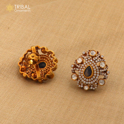 Sterling silver kundan stone and polki charm necklace set with intricate jewelry design, featuring white stones and traditional craftsmanship.