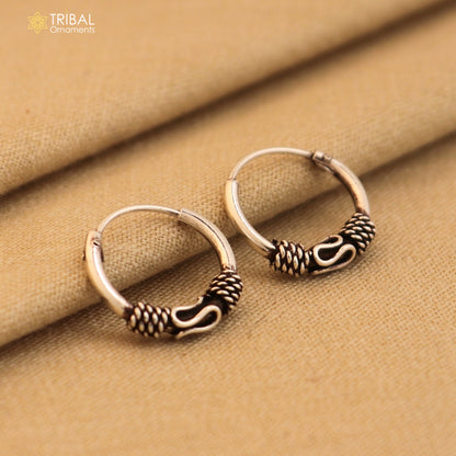 Sterling silver wired Bali hoops earrings with tribal tribal design, showcasing intricate ethnic jewelry craftsmanship.