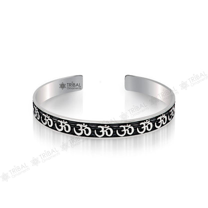 Sterling silver 'AUM' mantra adjustable bangle cuff by TRIBAL ORNAMENTS, unisex handcrafted jewelry with divine, stylish design.