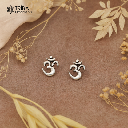 Sterling silver handmade Aum Om stud earring by TRIBAL ORNAMENTS featuring Indian idol symbol for unisex jewelry.