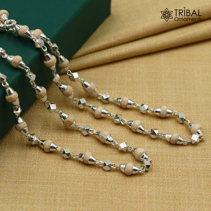 Sterling silver handmade Tulsi mala necklace with holy basil wooden beads, ideal for Ayurveda meditation.