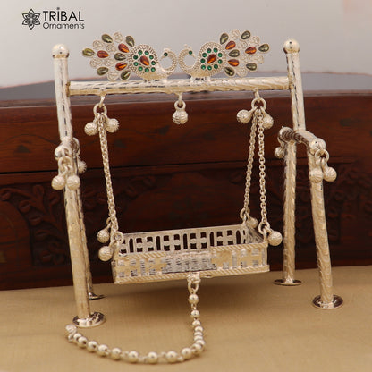 Sterling silver peacock design Bal Gopala Krishna swing, tribal art of child Krishna on a decorative jhula by TRIBAL ORNAMENTS