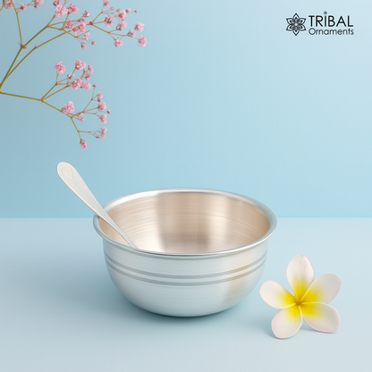 Handmade 999 fine silver bowl and spoon set for serving food or puja, crafted by TRIBAL ORNAMENTS with intricate details.
