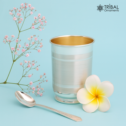 Handmade 999 fine silver water and milk tumbler, silver flask, and kids silver cup with spoon from Tribal Ornaments.