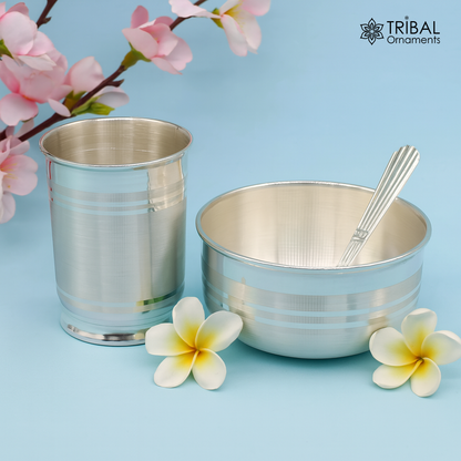 Silver baby food utensils set including a water glass, bowl, tumbler, and spoon in 999 fine silver by Tribal Ornaments.