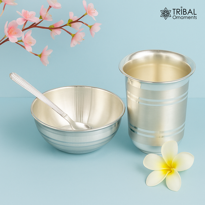Silver baby feeding set with milk glass, bowl, tumbler, spoon, and utensils in 999 fine silver, crafted by Tribal Ornaments.