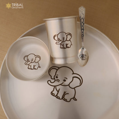 999 silver baby dinner set including bowl, spoon, tumbler, and plate from Tribal Ornaments, with intricate traditional designs.