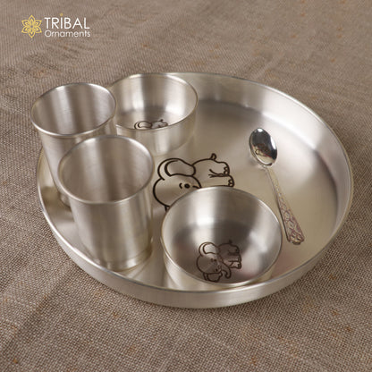 999 silver baby dinner set including bowl, spoon, tumbler, and plate with tribal ornaments design by TRIBAL ORNAMENTS.
