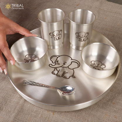 Tribal Ornaments 999 silver baby dinner set with bowl, spoon, tumbler, and plate tray, featuring intricate design and craftsmanship.