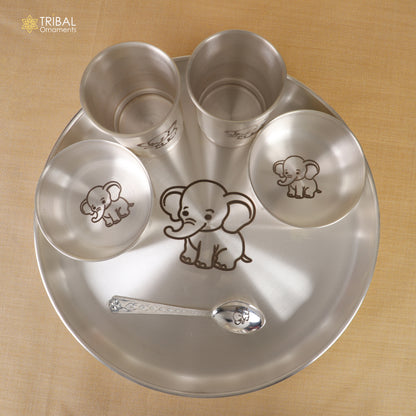 999 silver baby dinner set with bowl, spoon, tumbler, and plate from Tribal Ornaments, featuring intricate traditional silver utensils.