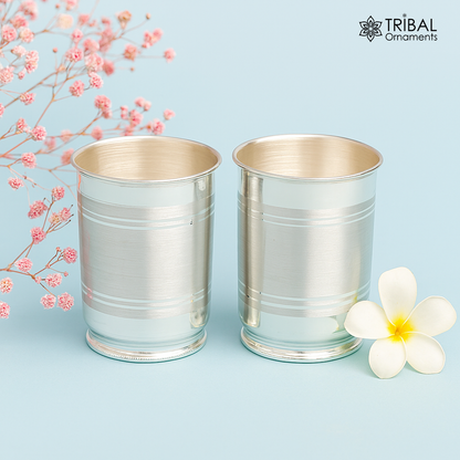 Handmade 999 silver baby glass set with tumblers for water and milk, including silver vodka and wine glasses, detailed craftsmanship.