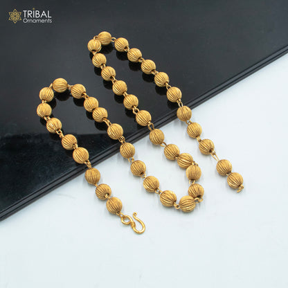 Sterling silver 9mm beaded chain necklace with gold polish, unisex jewelry by TRIBAL ORNAMENTS, showcasing a delicate design.
