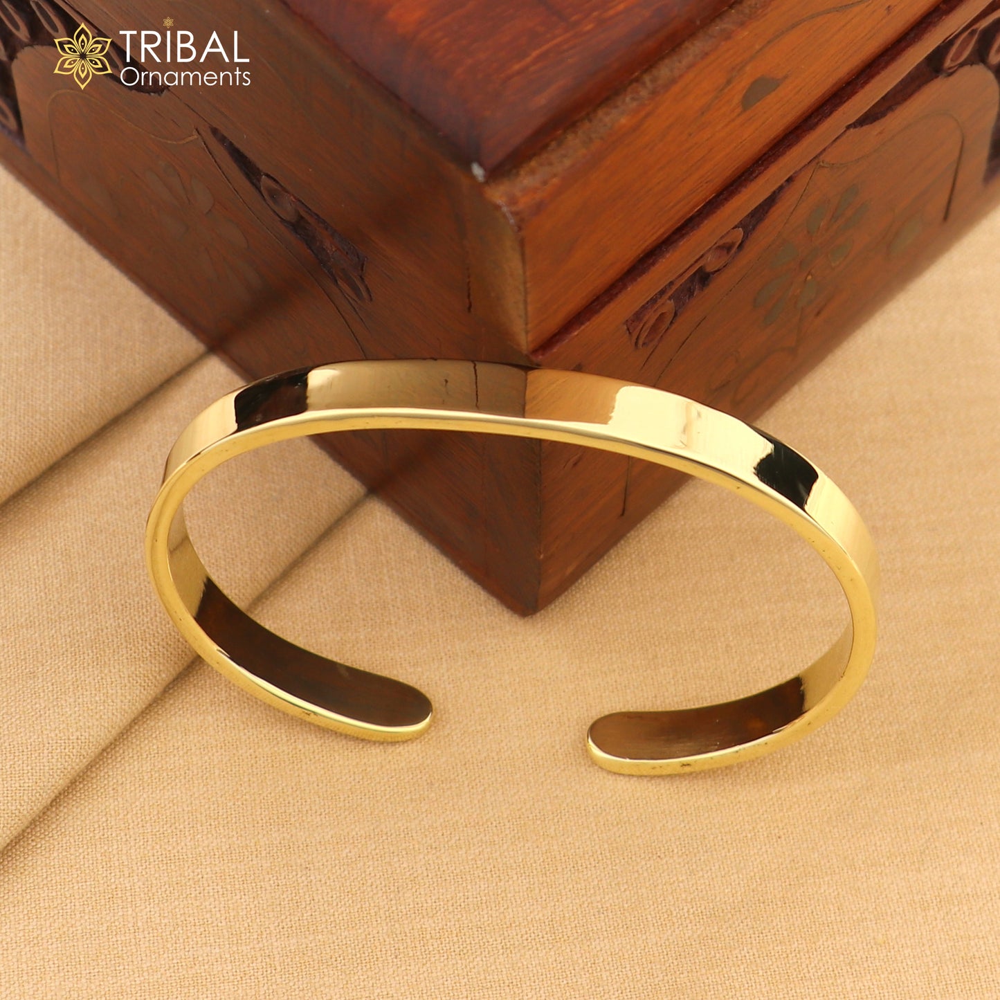 Plain shiny Ashtdhatu cuff kada bracelet by TRIBAL ORNAMENTS, unisex jewelry featuring a sleek, polished design.