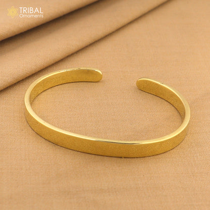 Plain shiny Ashtdhatu cuff bracelet by TRIBAL ORNAMENTS, unisex jewelry cuff with a sleek, minimalist design.