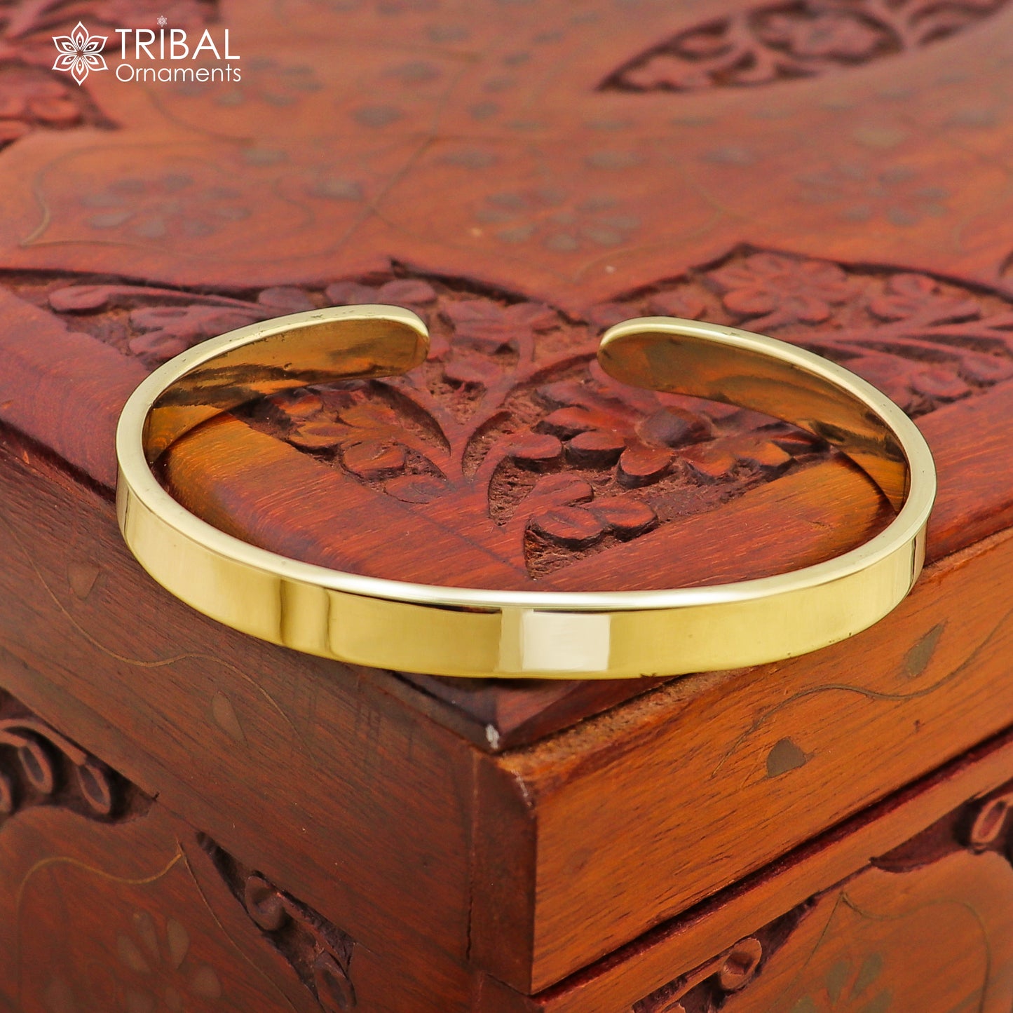 Plain shiny Ashtdhatu cuff bracelet by TRIBAL ORNAMENTS, unisex jewelry cuff with smooth finish, ideal for everyday wear.