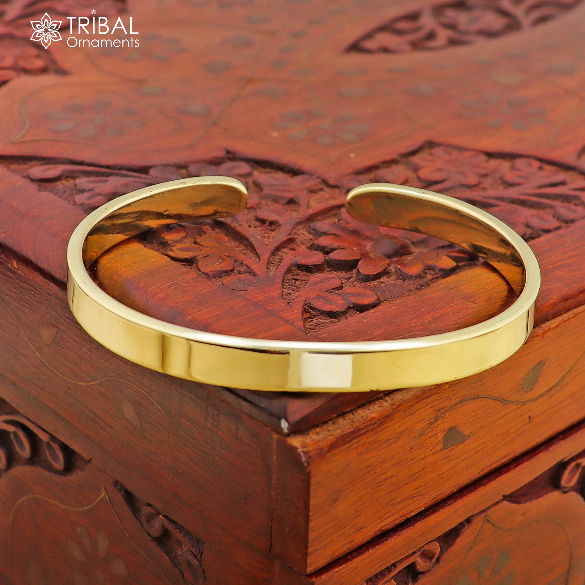 Plain shiny Ashtdhatu cuff bracelet by TRIBAL ORNAMENTS, unisex jewelry cuff with smooth finish, ideal for everyday wear.