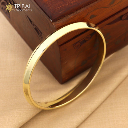Shiny plain Ashtdhatu kada bangle with casual unisex design, customized jewelry by TRIBAL ORNAMENTS.