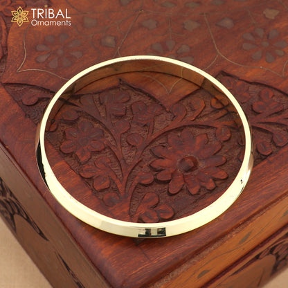 Plain shiny Ashtdhatu kada bangle with casual design, unisex jewelry by TRIBAL ORNAMENTS, customizable and stylish.