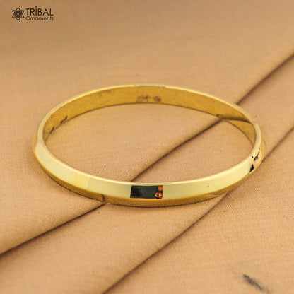 Shiny plain Ashtdhatu kada bangle with casual unisex design, customized jewelry by TRIBAL ORNAMENTS.