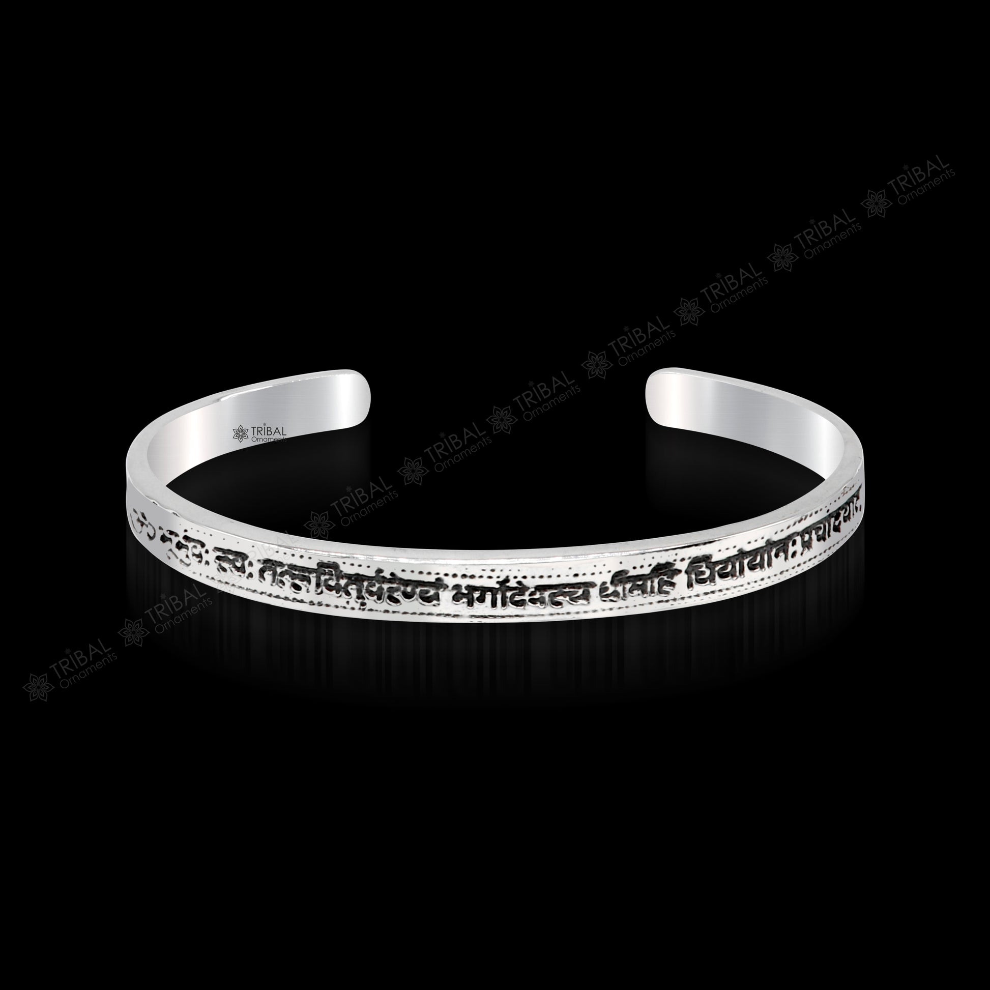 Sterling silver Gayatri Mantra cuff bracelet by Tribal Ornaments, unisex jewelry with adjustable design and engraved mantra.