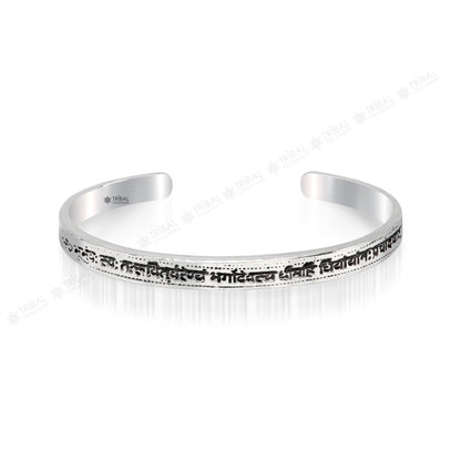 Sterling silver Gayatri Mantra cuff bracelet by TRIBAL ORNAMENTS, unisex jewelry with adjustable design and intricate mantra engraving.