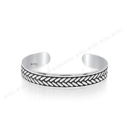Sterling silver Tiger design cuff bracelet by Tribal Ornaments, unisex jewelry with adjustable fit and intricate tiger motif.