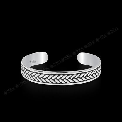 925 sterling silver Tiger design cuff bracelet by Tribal Ornaments, unisex jewelry with easy adjustability and bold tiger motif.