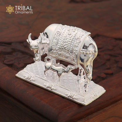 Sterling silver divine cow with calf featuring vintage Nakshi work, Kamdhenu deity, and intricate tribal ornament design.