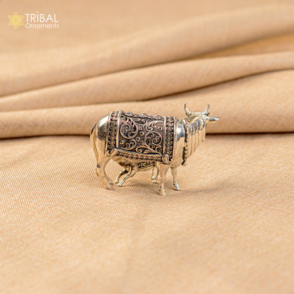 Silver Kamdhenu cow with calf, vintage Nakshi work design, religious deity cow, detailed tribal silver worshipping art.