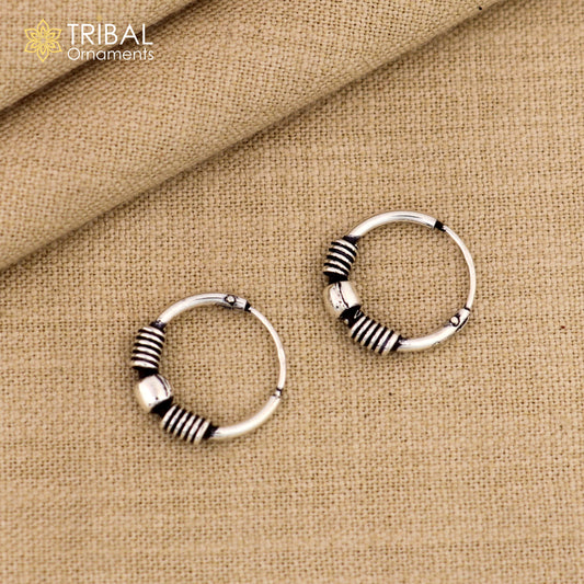 Sterling silver handmade small hoop earrings by TRIBAL ORNAMENTS, featuring stylish Bali tribal jewelry design for gifting or everyday wear.