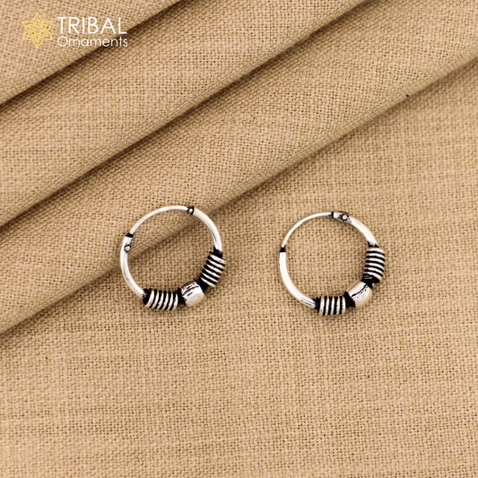 Small handmade sterling silver hoops earrings by TRIBAL ORNAMENTS, featuring stylish tribal jewelry design from Bali.