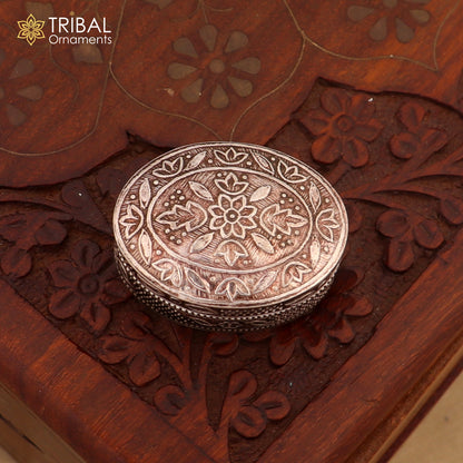Small bridal kajal box made of 925 sterling silver, decorative trinket or jewelry container with intricate tribal design.
