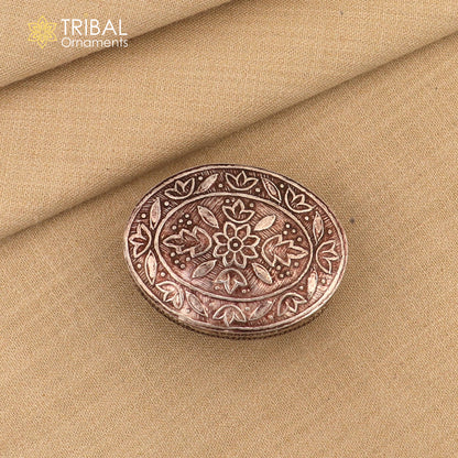 Small bridal kajal box by TRIBAL ORNAMENTS, sterling silver jewelry and trinket box with intricate tribal design and vermilion accents.