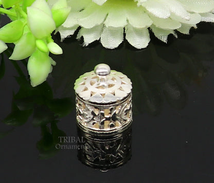 Small sterling silver Kapoor holding box by Tribal Ornaments, elegant jewelry and attar container with intricate design.