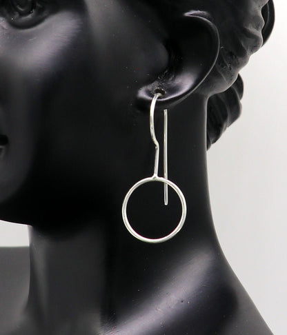 Sterling silver shiny circle hoop earrings from Tribal Ornaments, perfect for brides or gifting, with intricate design details.