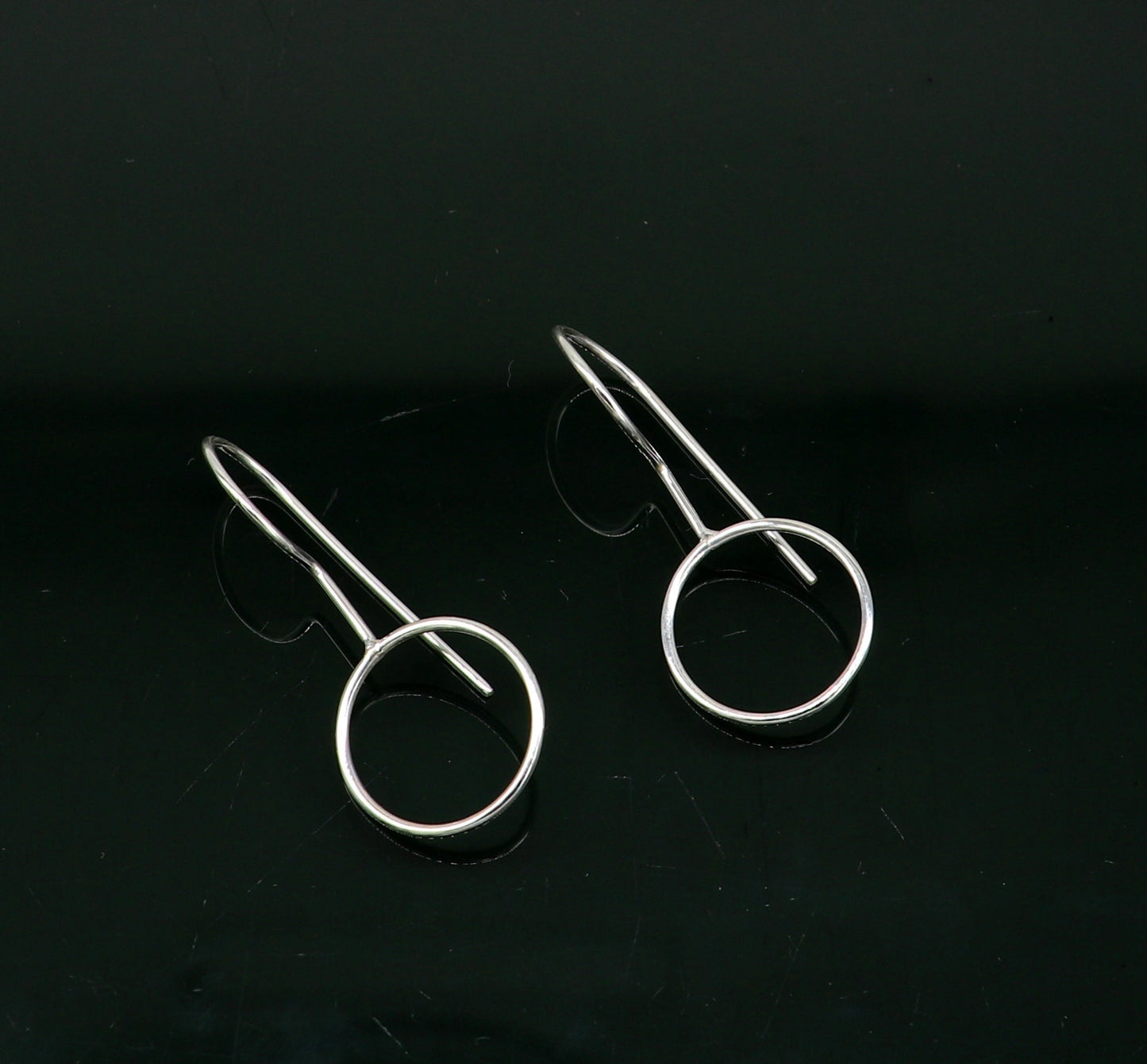 Sterling silver shiny circle hoops earrings from Tribal Ornaments, perfect for brides or gifting, featuring a elegant Indian design.