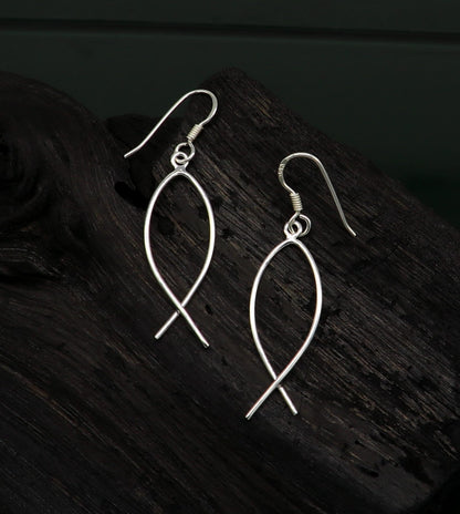Fabulous fish-shaped sterling silver hoop earring by TRIBAL ORNAMENTS, lightweight jewelry perfect for brides and custom gifting.